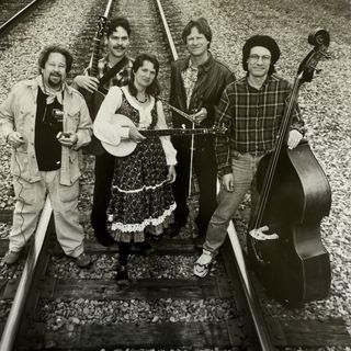 l to r: Paul Herzoff, Michael Harmon, Ingrid “Rosie” Noyes, Danny Carnahan, Bill Foss